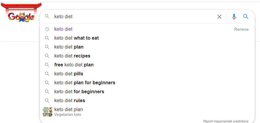 Przykład sugestii Google Autocomplete dla frazy marketing treści pokazujący popularne warianty wyszukiwania
